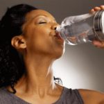 getty_rf_photo_african_american_woman_drinking_water-300x203